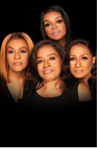 An image of all four clark sisters against a black background